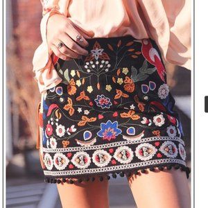 Trendy Embroidered Black Mini Skirt with Pom Poms!
